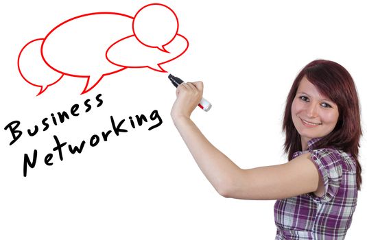 Businesswoman writing Network Concept on Whiteboard