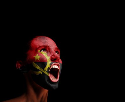 The Angolan flag on the face of a screaming woman. concept