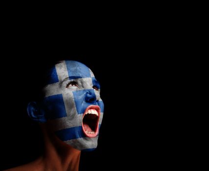 The Greek flag on the face of a screaming woman. concept