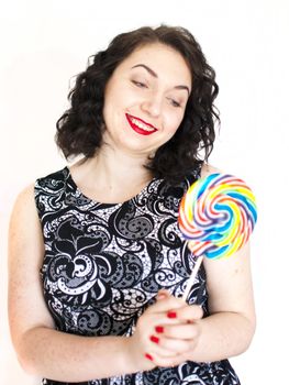 beautiful retro girls portrait with colorful lollipop