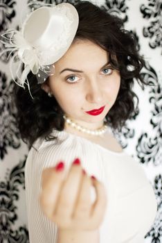 beautiful retro girl portrait in vintage style dress