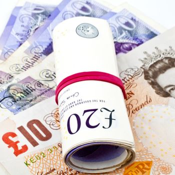 British Cash close-up over a white background.