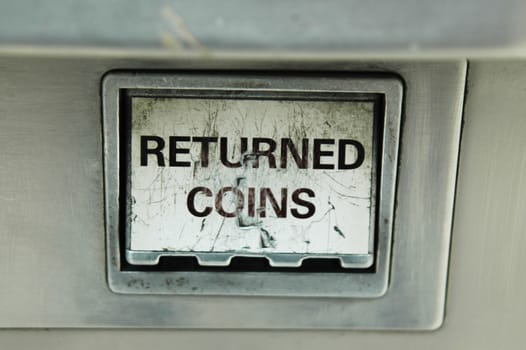 Close up of the change drawer in the ticket machine