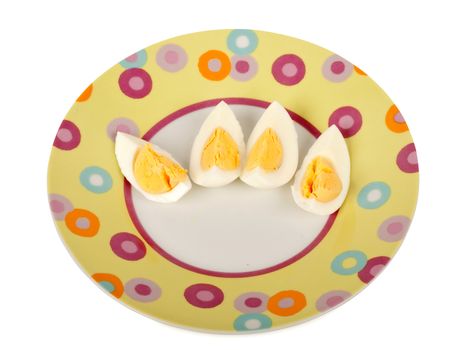 sliced boiled egg on kitchen plate