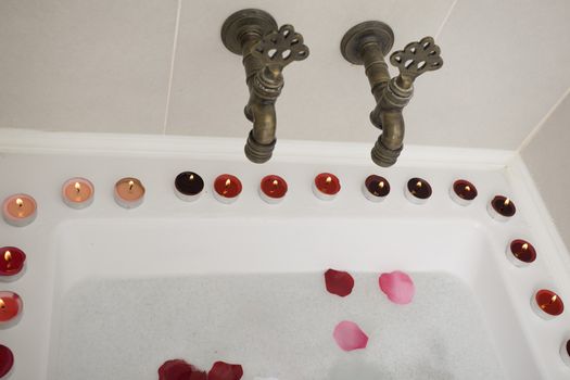 Bath water with rose petals