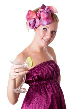 Glamorous woman in pink with cocktail isolated on white