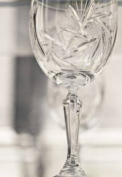 Detail of old crystal wineglass