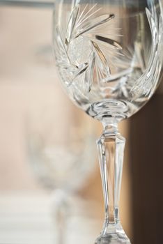 Detail of old crystal wineglass