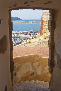 view of the harbor at Castellammare del Golfo, from ancient stone arch. Sicily