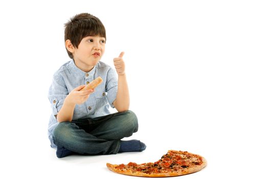 Little Boy Eating Pizza and Thumbs Up isolated on white background