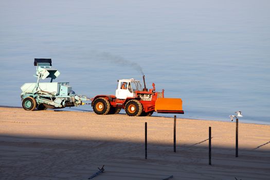 beach cleaning machine at work