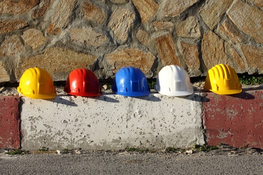 Some helmets close up on work place 