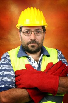 Worker with protective gear with folded hands