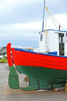 Fishing boats repair in the harbor of Husavik, Iceland