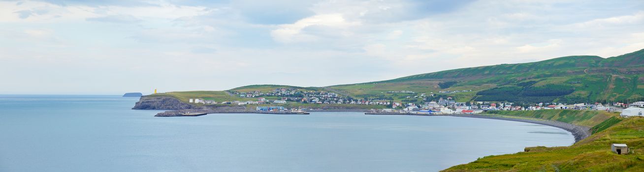 Icelandic coastal village of Husavik in summer. Panorama