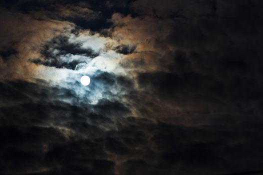 night shoot of moon on cloudy sky