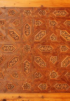 Antique carved wooden ornament in Alhambra, Spain