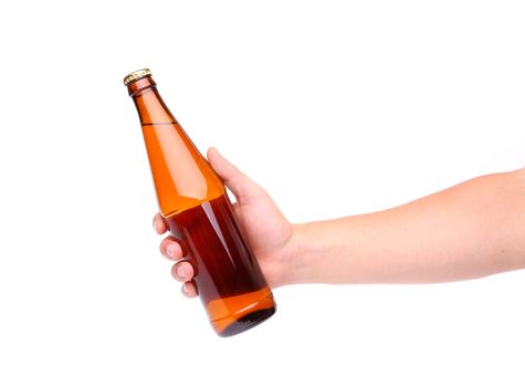 A hand holding up a yellow beer bottle without label over a white background vertical format