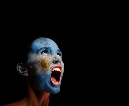 The Argentine flag on the face of a screaming woman. concept