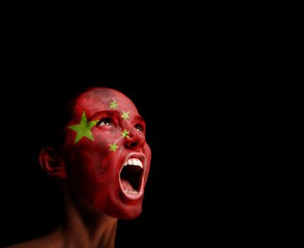 The Chinese flag on the face of a screaming woman. concept