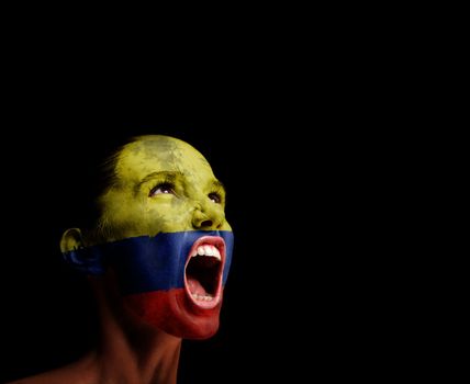 The Colombian flag on the face of a screaming woman. concept