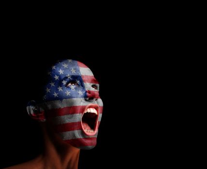 The USA flag on the face of a screaming woman. concept