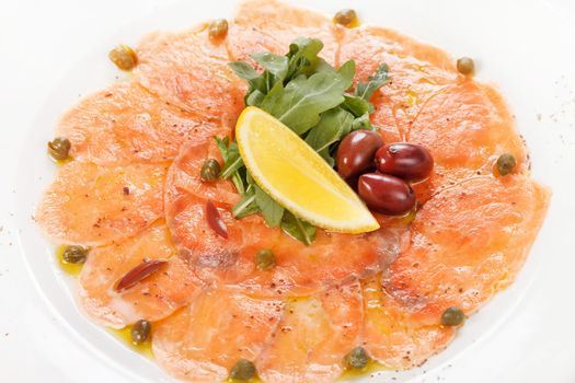 Fish Carpaccio with salad 