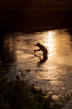 fisherman on the rive