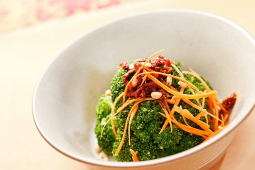 broccoli with carrot and dried tomato