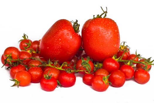 fresh red tomatoes isolated on white