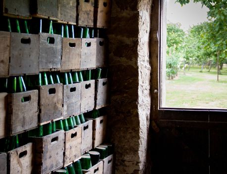 cider bottles in wooden boxes