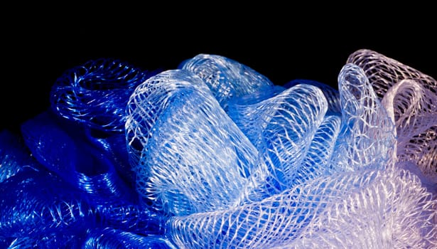 plastic texture in blue and white colors isolated on black