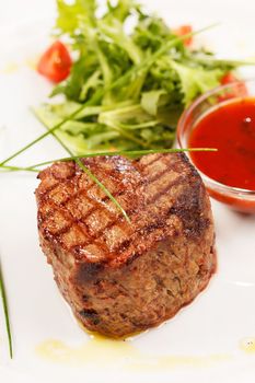 Grilled steak with sauce