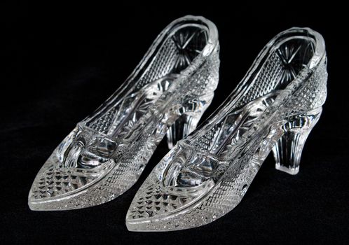 The pair crystal shoes in the black backround