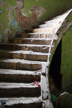 old broken staircase in the abandoned house