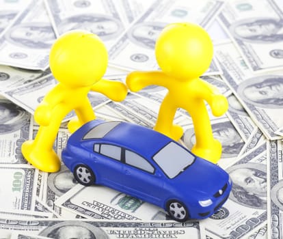 Car purchase and sale. Two toy little men, cash dollars and car
