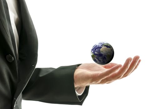 Businessman hand holding small globe. Isolated over white background. 