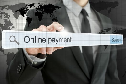Online payment written in search bar on virtual screen.