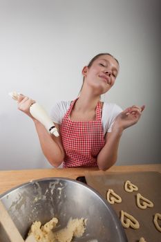 young woman baking cookies