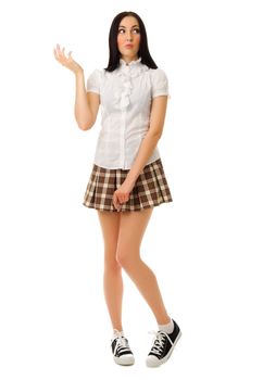 Modest girl in plaid skirt isolated