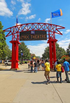 CHICAGO, ILLINOIS - SEPTEMBER 4: Tourists at the main entrance to Navy Pier in Chicago, Illinois on September 4, 2011. The Pier is a popular destination for tourists on the shoreline of Lake Michigan.