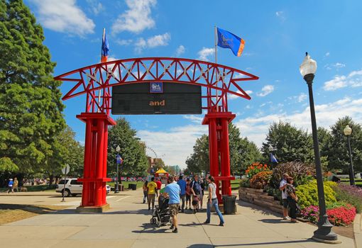 CHICAGO, ILLINOIS - SEPTEMBER 4: Tourists at the main entrance to Navy Pier in Chicago, Illinois on September 4, 2011. The Pier is a popular destination for tourists on the shoreline of Lake Michigan.