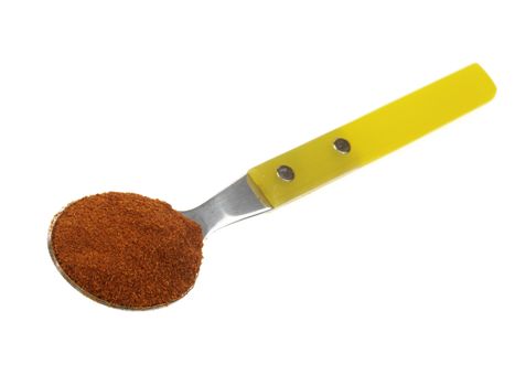 Spoonful of Cayenne Pepper Isolated White Bakcgorund