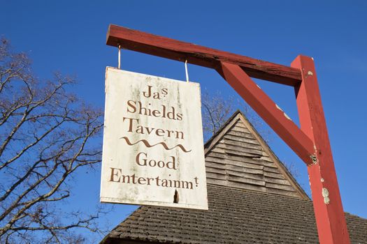 WILLIAMSBURG, VIRGINIA - NOVEMBER 27: Sign for Shields Tavern in Colonial Williamsburg, Virginia, November 27, 2011. The restored town is a major attraction for tourists and meetings of world leaders.