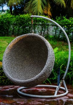 Hanging rattan chair for outdoor use