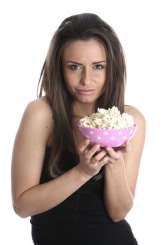 Model Released. Woman Eating Popcorn