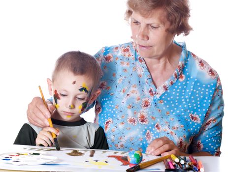 Grandmother teaches his grandson drawing isolated