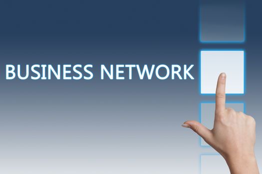 Business concept: hand pressing business network button on a touch screen interface.