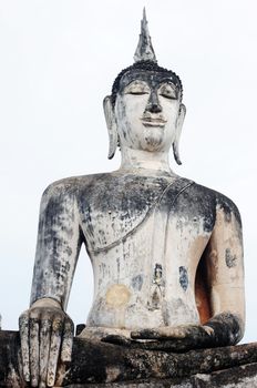 Statue of a deity in the Historical Park of Sukhothai, Thailand