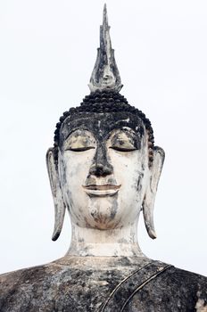 Statue of a deity in the Historical Park of Sukhothai, Thailand